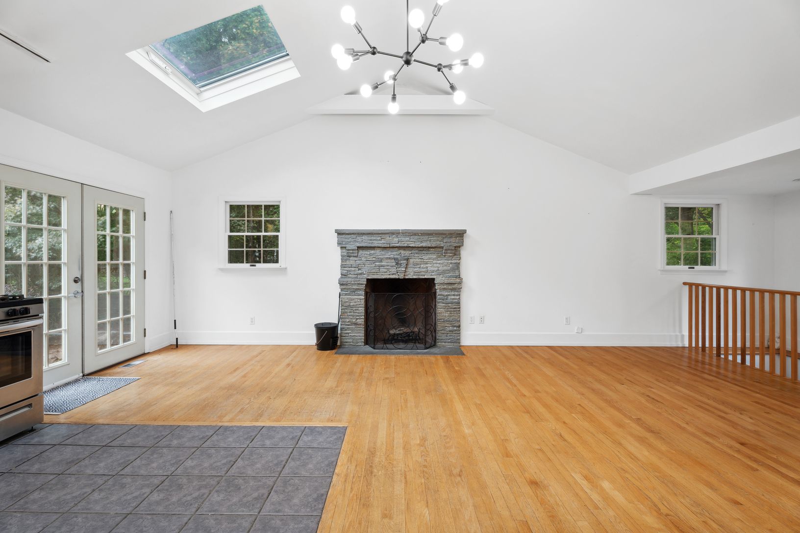  Stone fireplace and stairway on the right side