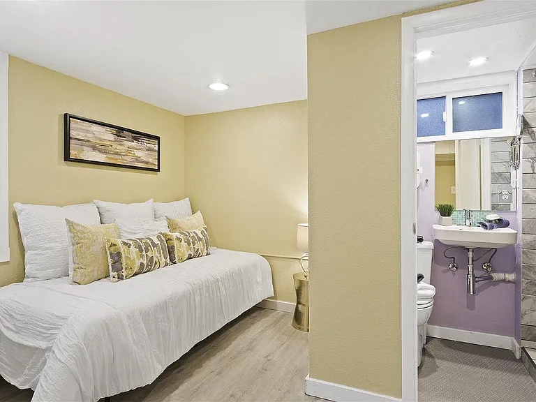 Bedroom has large window and can accommodate queen sized bed.
