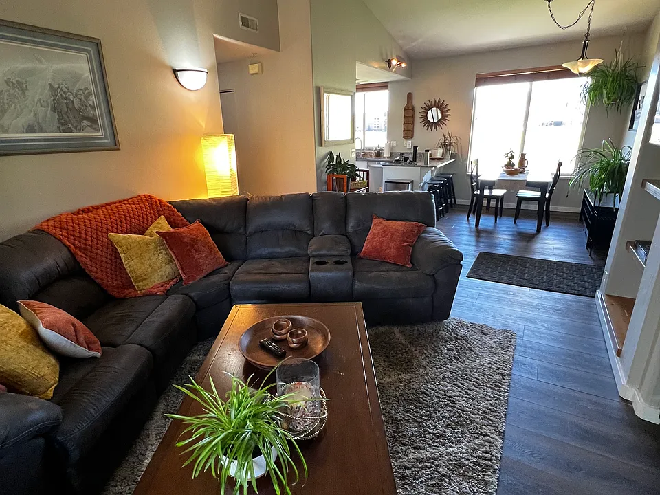 View from the deck, through the living room into the dining room and kitchen