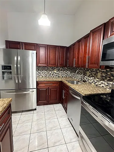 927 NE 199th St #206 Photo 1