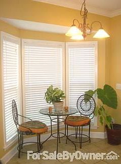 Breakfast Nook
						:
						Breakfast area adjacent to kitchen with bay window and overhead accent light.