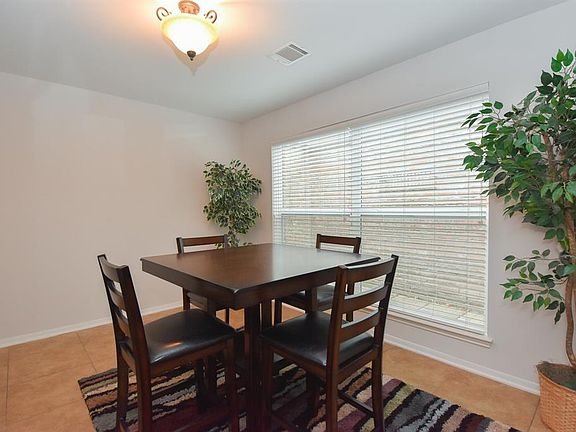 Formal dining room off the front foyer is a great place for entertaining and for holiday dinners.
