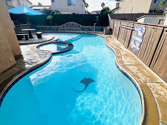 Deep and kiddie pool areas.