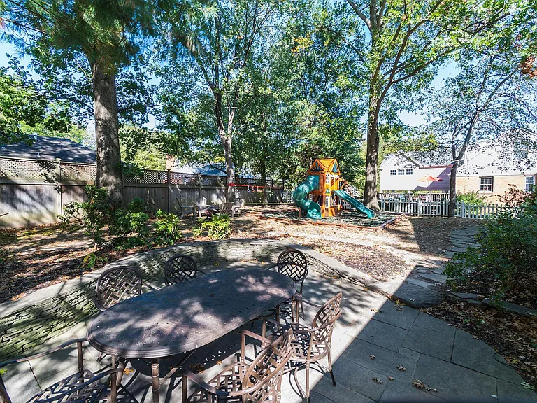 Great backyard with entertaining space and kid play space.