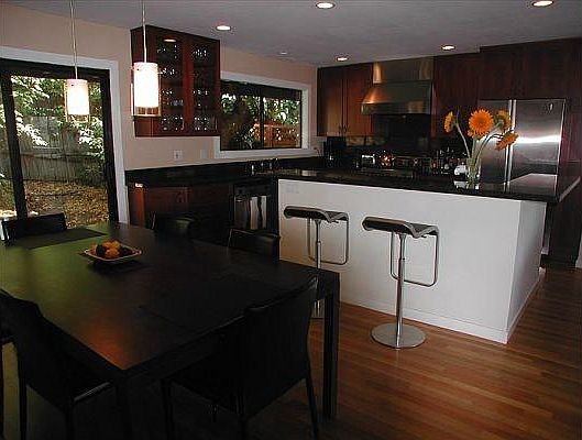 Dining Area & Kitchen with Raised Bar-top Island