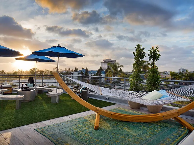 Rooftop deck with multiple seating areas