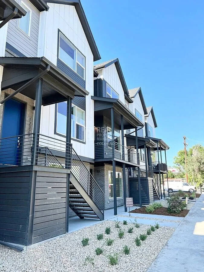 Welcome to Modern Living at 12328 W 52nd Ave — Photo 1