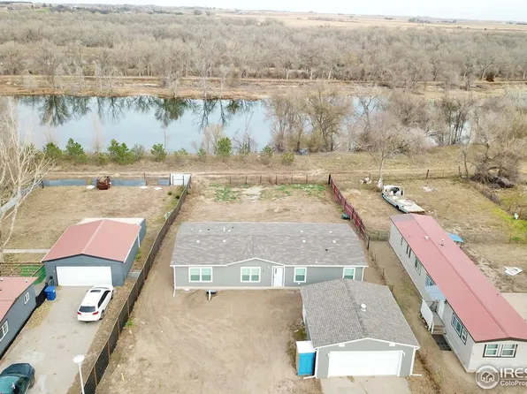 220 Crest Dr, Log Lane Village, CO 80705