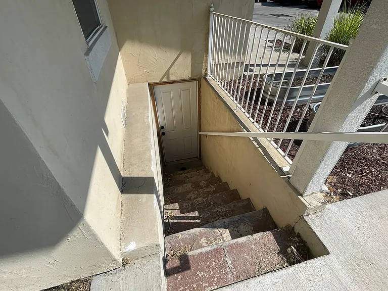 Exterior entrance for basement storage space/mechanical room