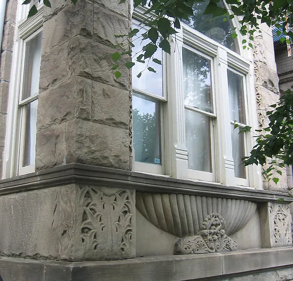 historical stone facade, with sculptures