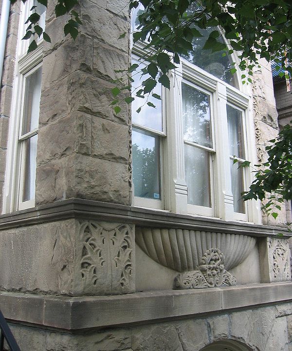 historical stone facade, with sculptures