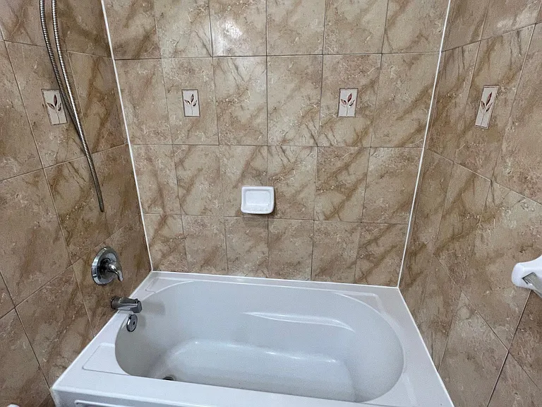 Newly refreshed bathroom with large soaking tub.