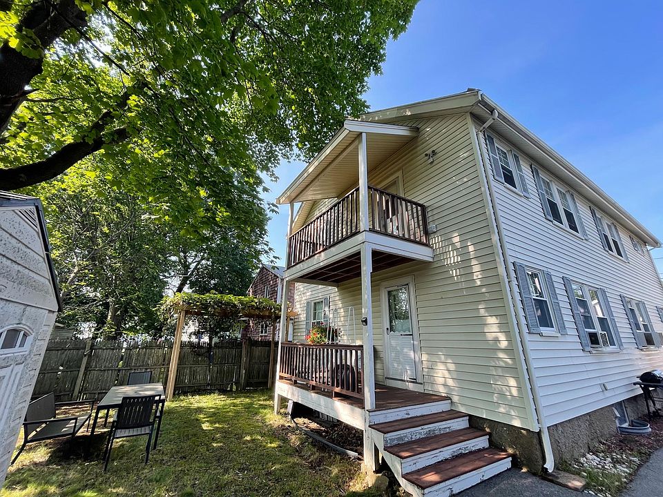 Backyard, back entrance and deck (upper level)
