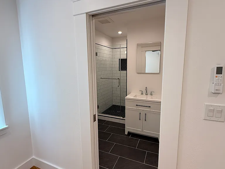 MASTER BEDROOM - VIEW TO EN-SUITE BATHROOM