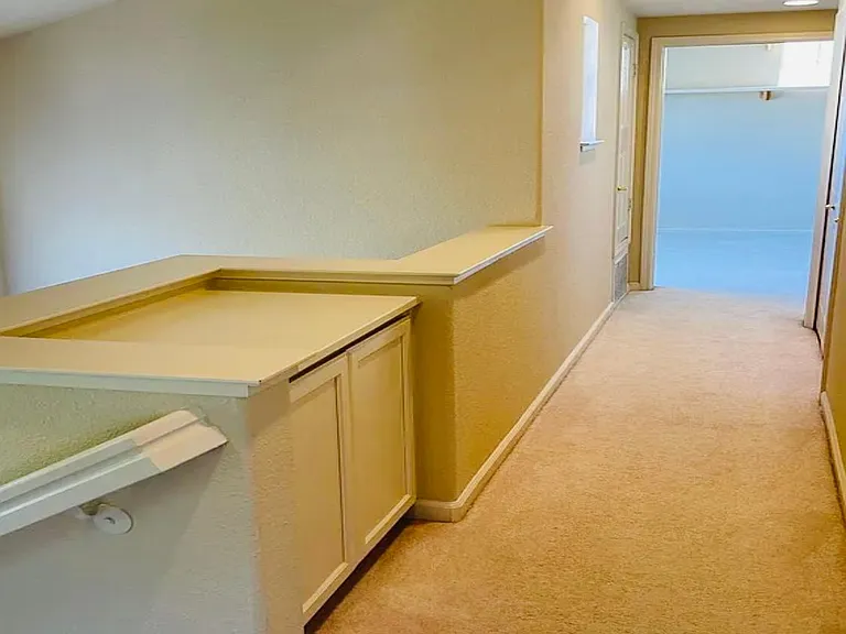 Upstairs one side to the master bedroom, and one side to the other two spacious bedrooms.