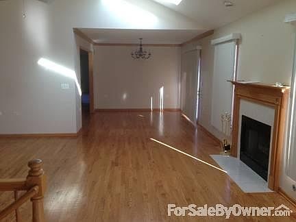 Living Room and Dining Room
						:
						Beautiful hardwood floors, cathedral ceiling, skylights, and gas fireplace.