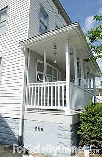 Front Porch 1
						:
						A look at the front porch from the driveway.