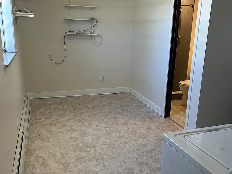 Bonus area by laundry room. Gaming area or crafting space or bike repair.