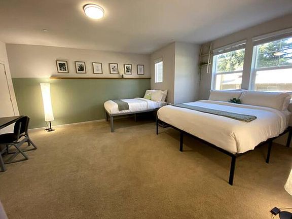 Catch some 'zzz's! This room is equipped with a king-size bed and desk/chair.