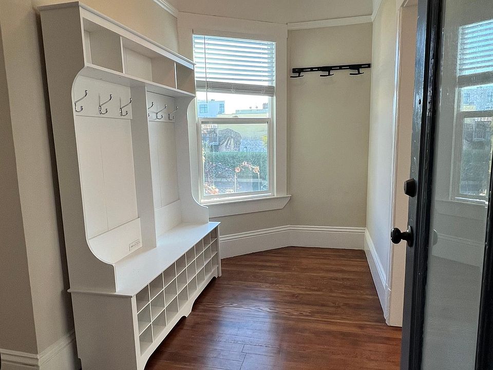 Apartment Entry with space for e-scooter charging and bike rack