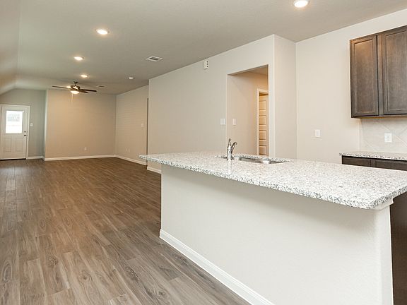 Dining Area to Kitchen and Family Room