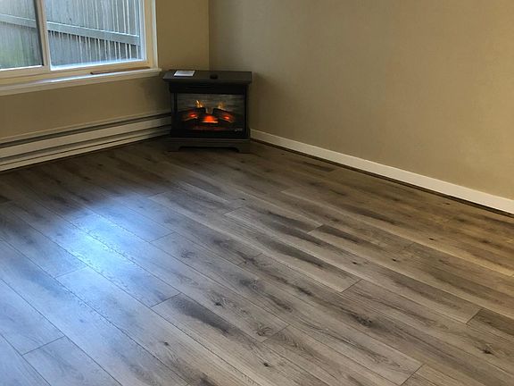 Electric fireplace gives the living room a cozy feel