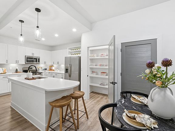 Kitchen with Quartz Countertop and Stainless Steel Appliances