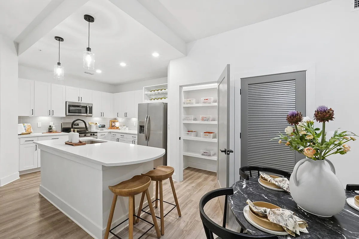 Kitchen with Quartz Countertop and Stainless Steel Appliances - Linz Bayview