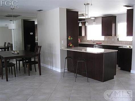 DINING, GREAT ROOM OPEN TO KITHCEN