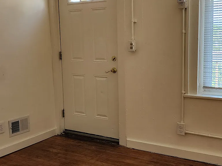 3rd bedroom, back exit door to balcony deck