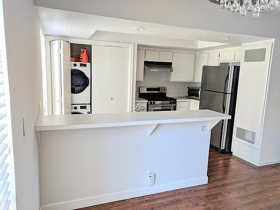 Kitchen with laundry area