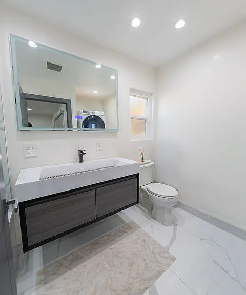 7719 Rhodes Ave — Photo 12