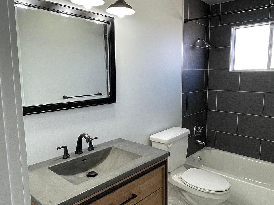 New Bathroom Vanity, Toilet, Tub and Tile Surround