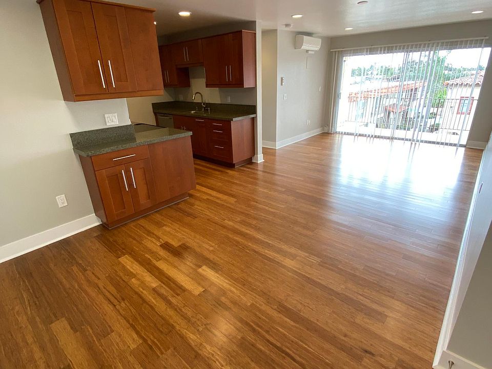 Beautifully Updated with Open Floor Plan and Recessed Lighting On Dimmers.