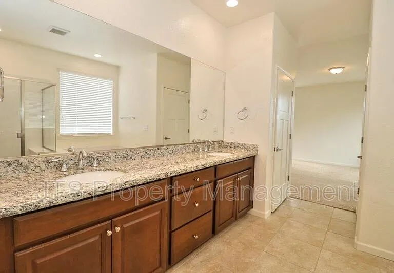 5122 Mossy Stone Way — Photo 49