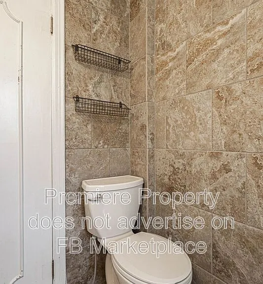 1107 W 27th St S — Photo 12