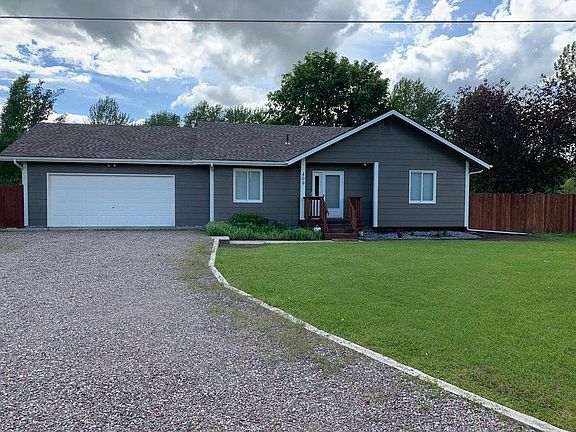 Front with two car garage.