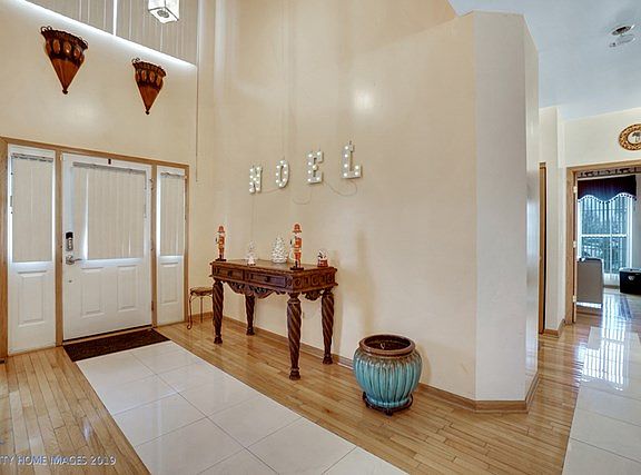 2 story entryway with large windows