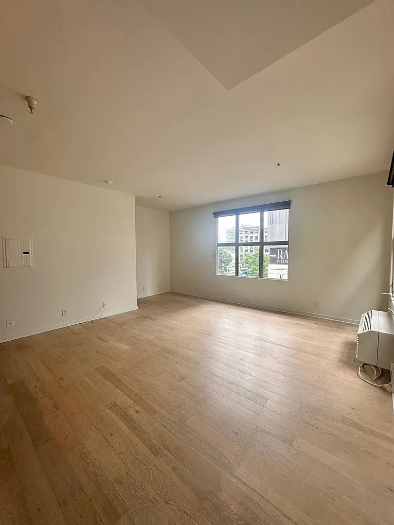 Downtown Gem | Modern Two-Level Loft With Private Patio & Rooftop Deck — Photo 1