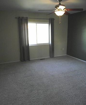 Master bedroom is generous and looks out to the back yard. Adjoi