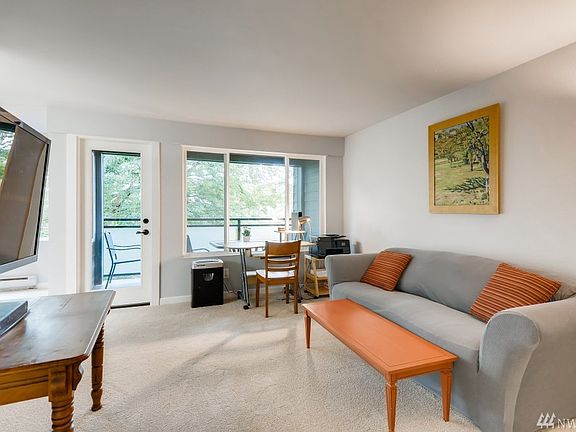 The living room faces East to the deck.  New carpet and paint.  