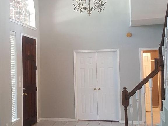 Formal Living Room / Foyer & Bedroom 1