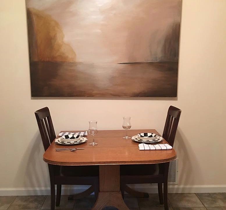 dining area table expands to seat 8 additional matiching cha