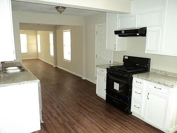 updated kitchen with gas appliances.