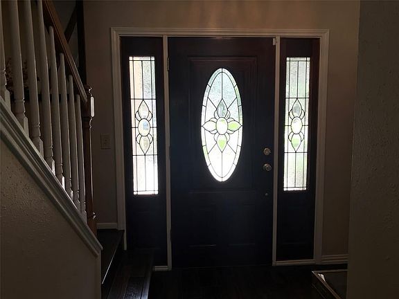 Lead glass door with side windows