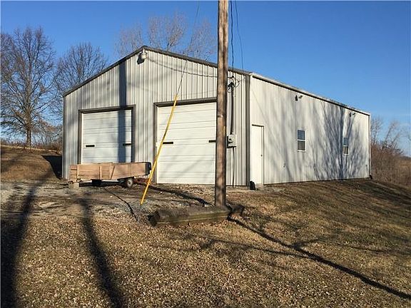 30X50 Metal Outbuilding with 3 10X10 doors plus one regular door......just for FUN!!