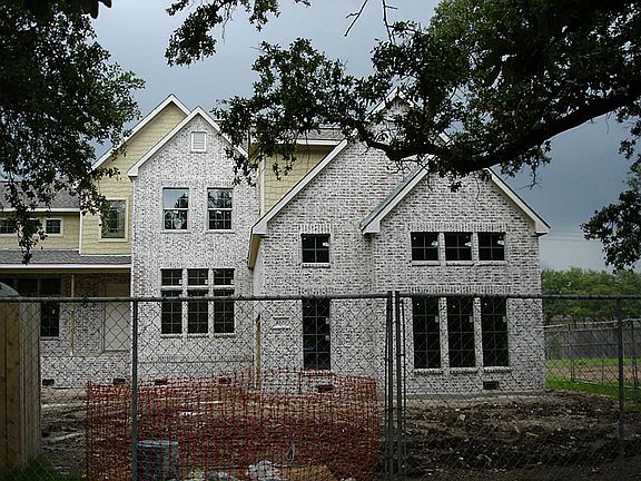 New Construction across the street and 2 doors down