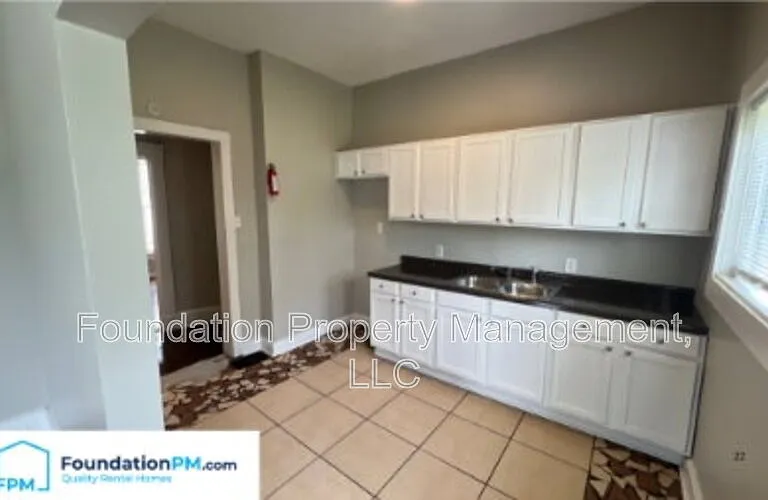 701 E Alston Ave — Photo 3