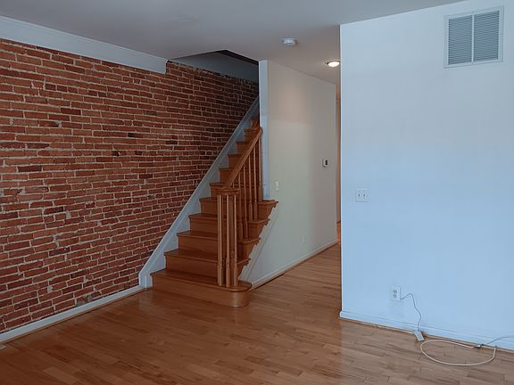 Living area, stairs to 2nd level