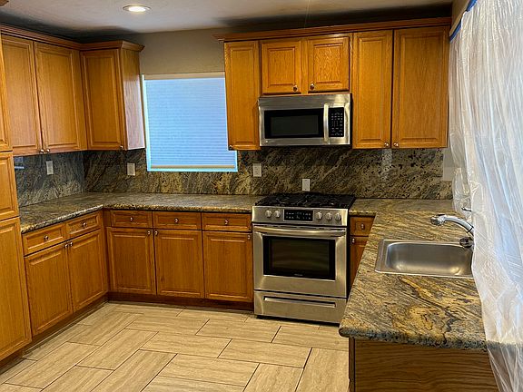 LIving, Dining and kitchen open floor plan with eat at bar